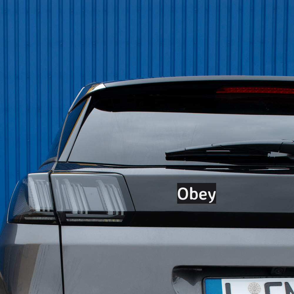 Durable 'Obey' bumper sticker made from PVC film, measuring 11.5 inches by 3 inches, suitable for vehicles.