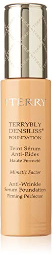 By Terry Terrybly Densiliss Wrinkle Control Serum Foundation in shade 7.5 Honey Gland, showcasing its elegant packaging and rich texture.