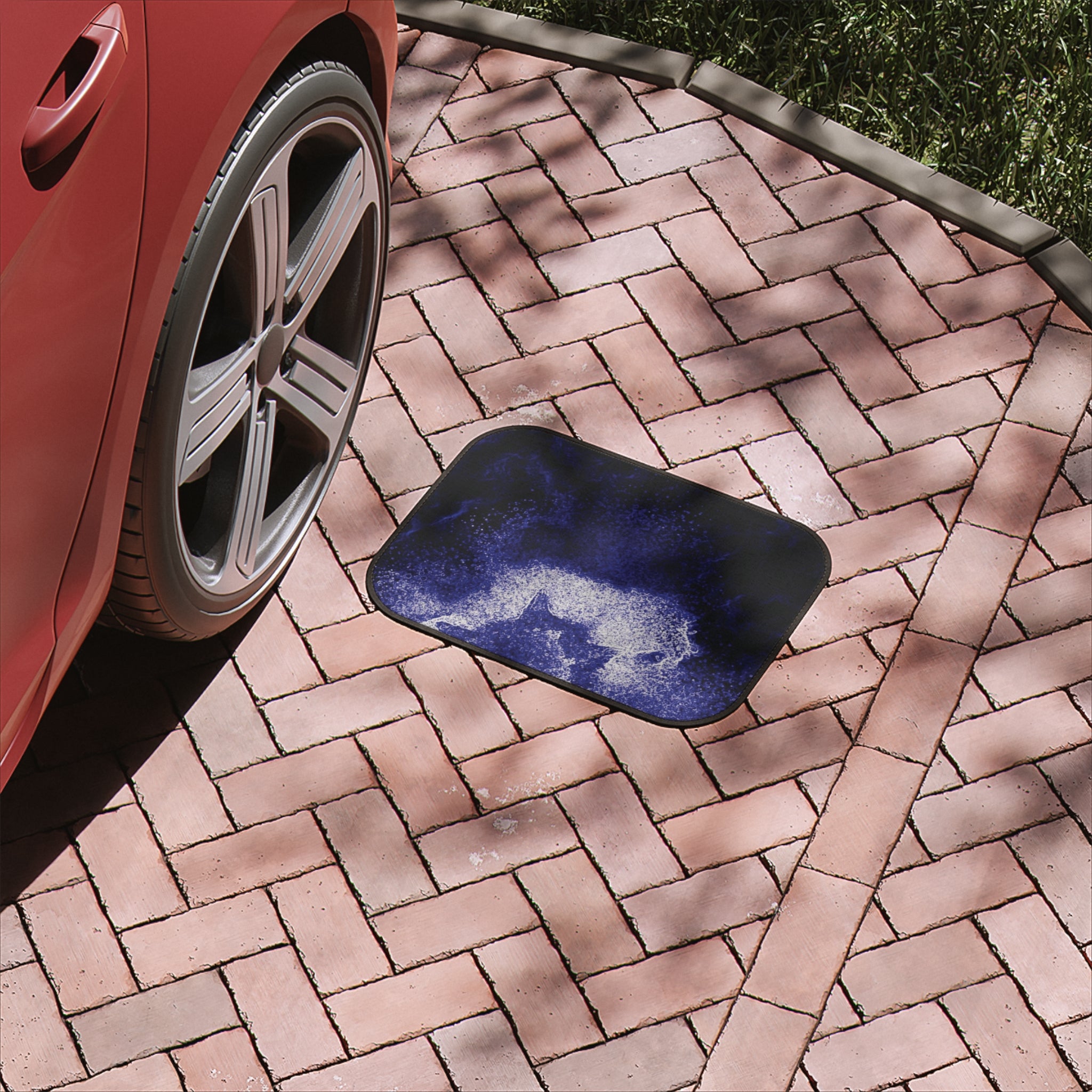 Purple car floor mat with durable polyester surface and non-skid rubber backing, designed for stylish vehicle interiors.