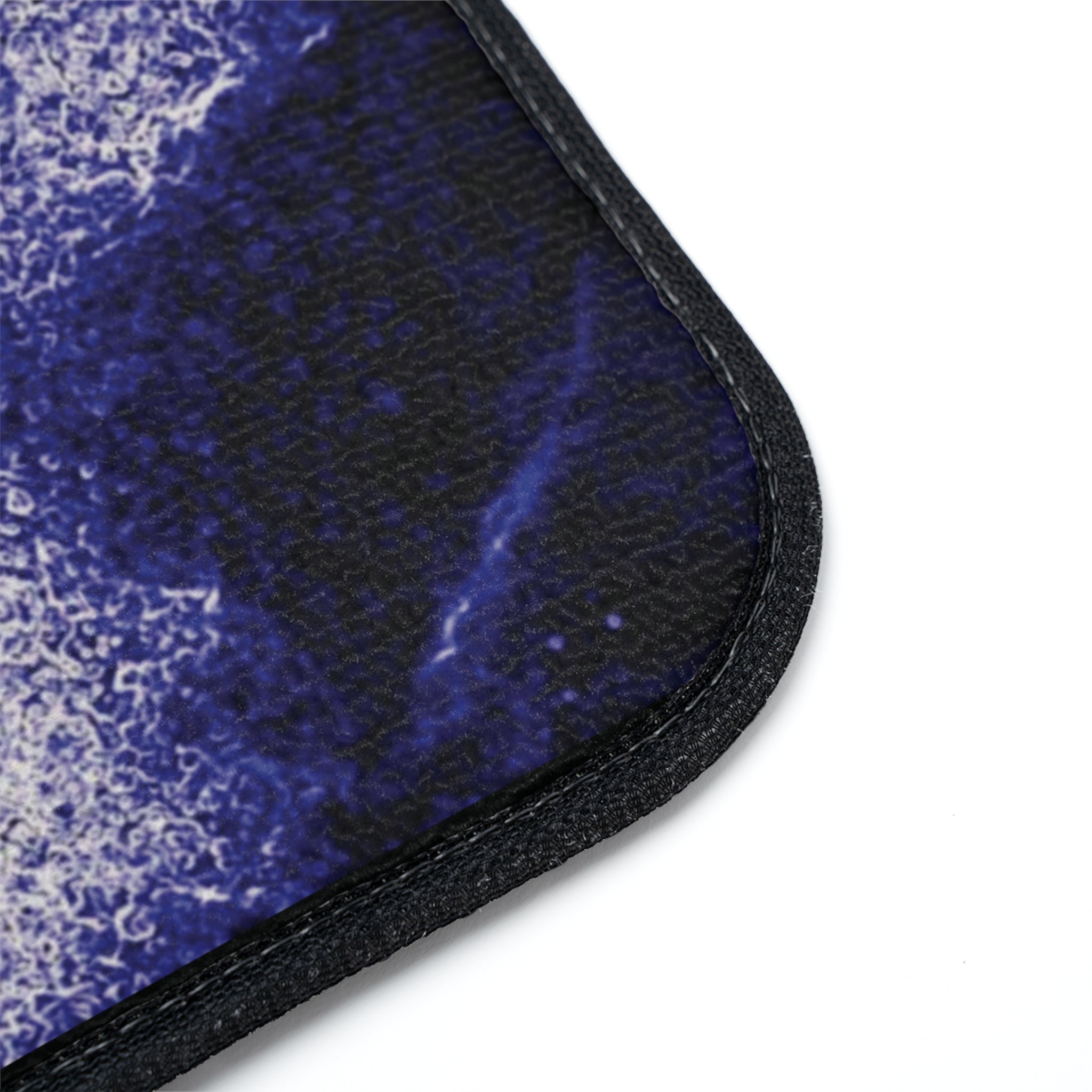 Purple car floor mat with durable polyester surface and non-skid rubber backing, designed for stylish vehicle interiors.