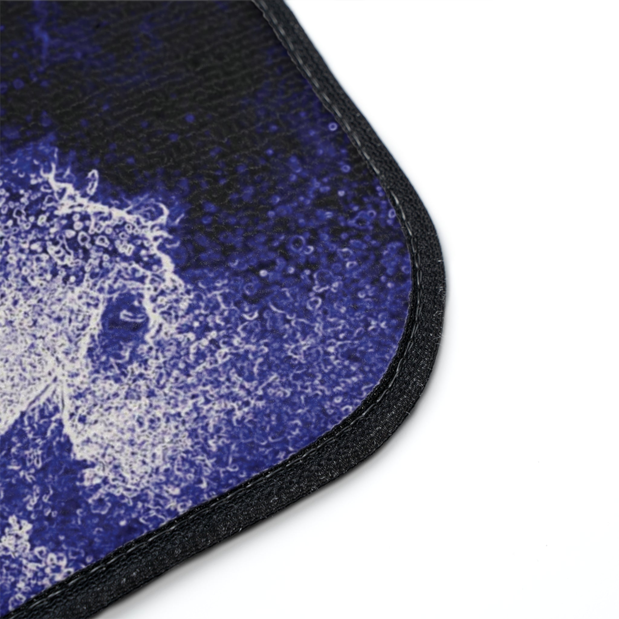 Purple car floor mat with durable polyester surface and non-skid rubber backing, designed for stylish vehicle interiors.