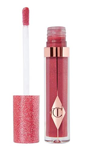Charlotte Tilbury Charlotte's Jewel Lips Lip Gloss in Walk Of No Shame, showcasing its luxurious packaging and rich color.