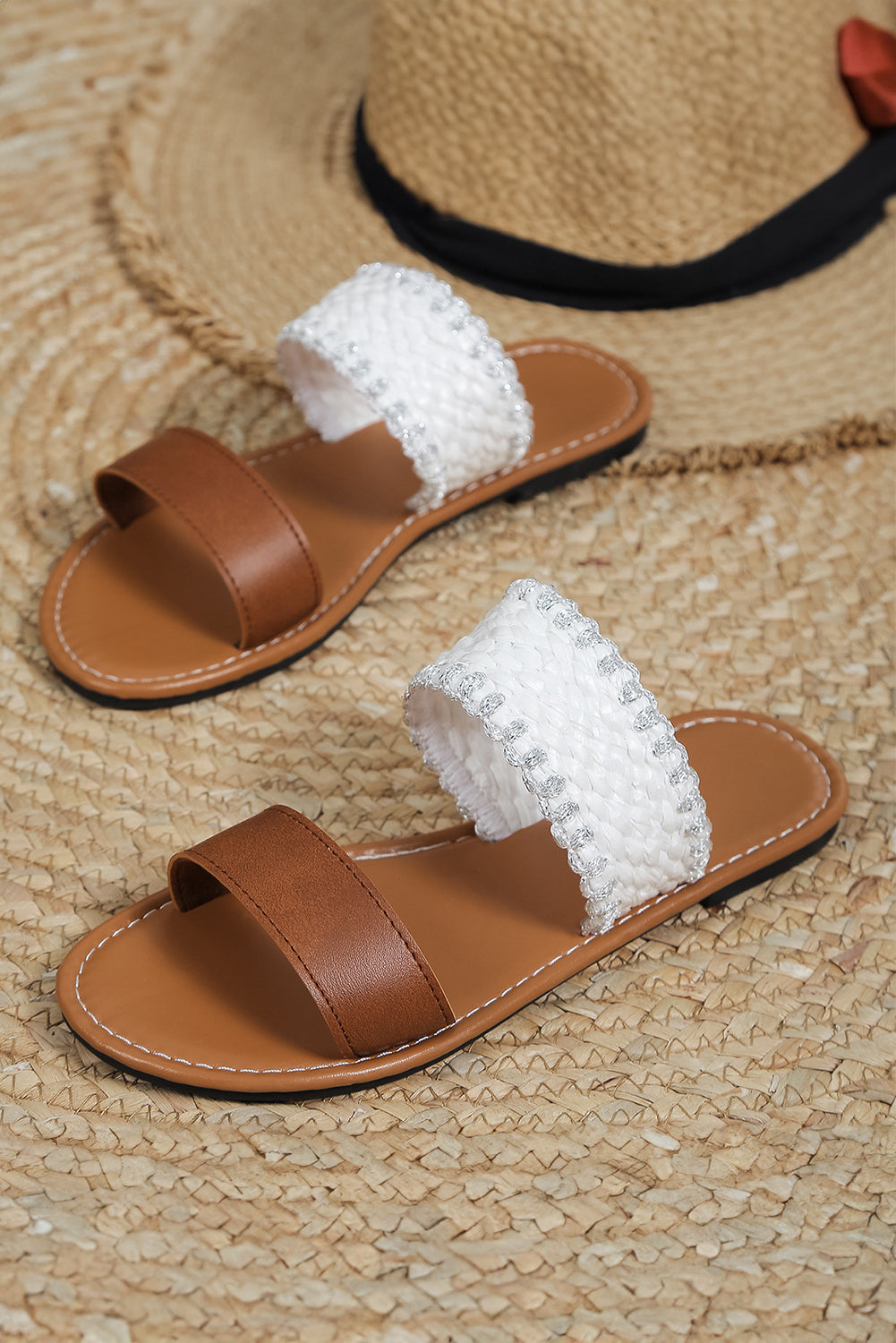 Chestnut faux leather flat slippers with woven strap design, showcasing comfort and style.