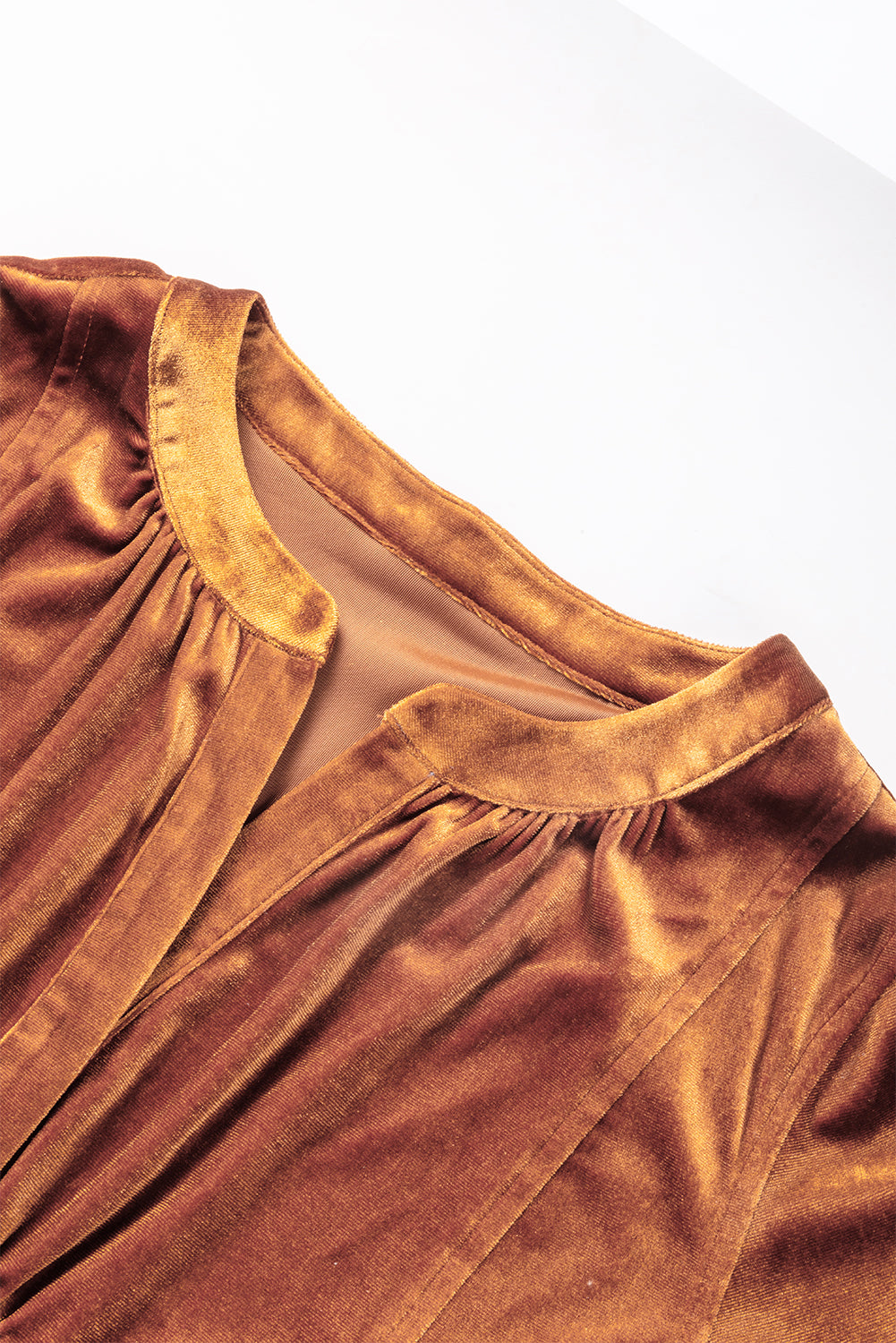 Chestnut Split Neck Velvet Tunic Dress featuring a V-neckline and pockets, made from soft velvet fabric.