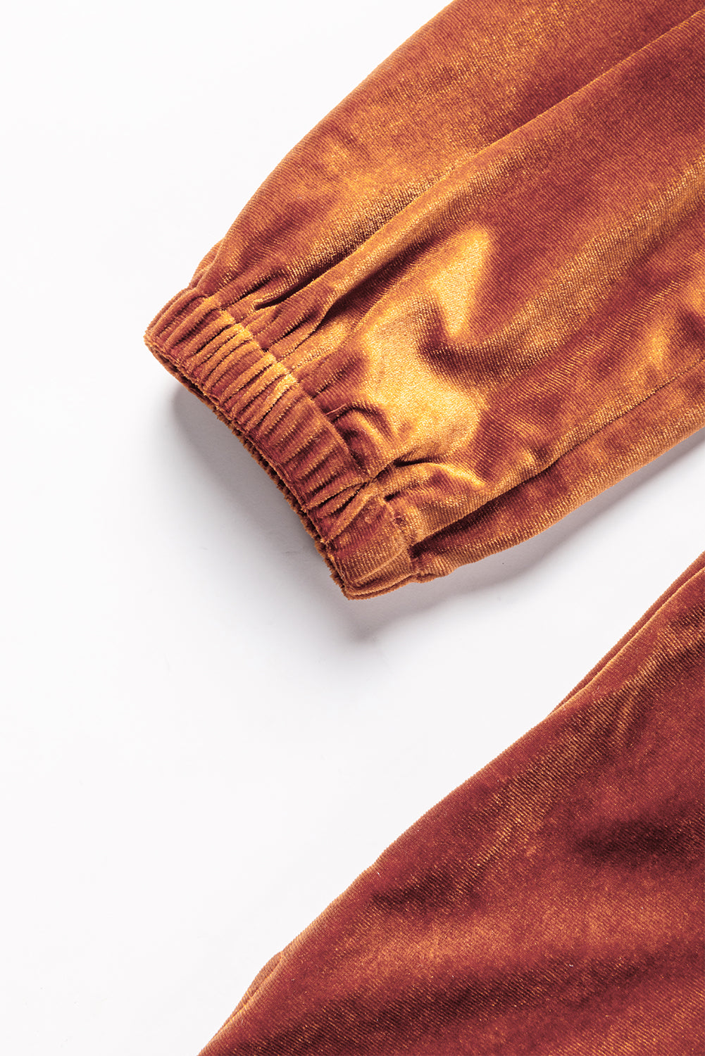 Chestnut Split Neck Velvet Tunic Dress featuring a V-neckline and pockets, made from soft velvet fabric.