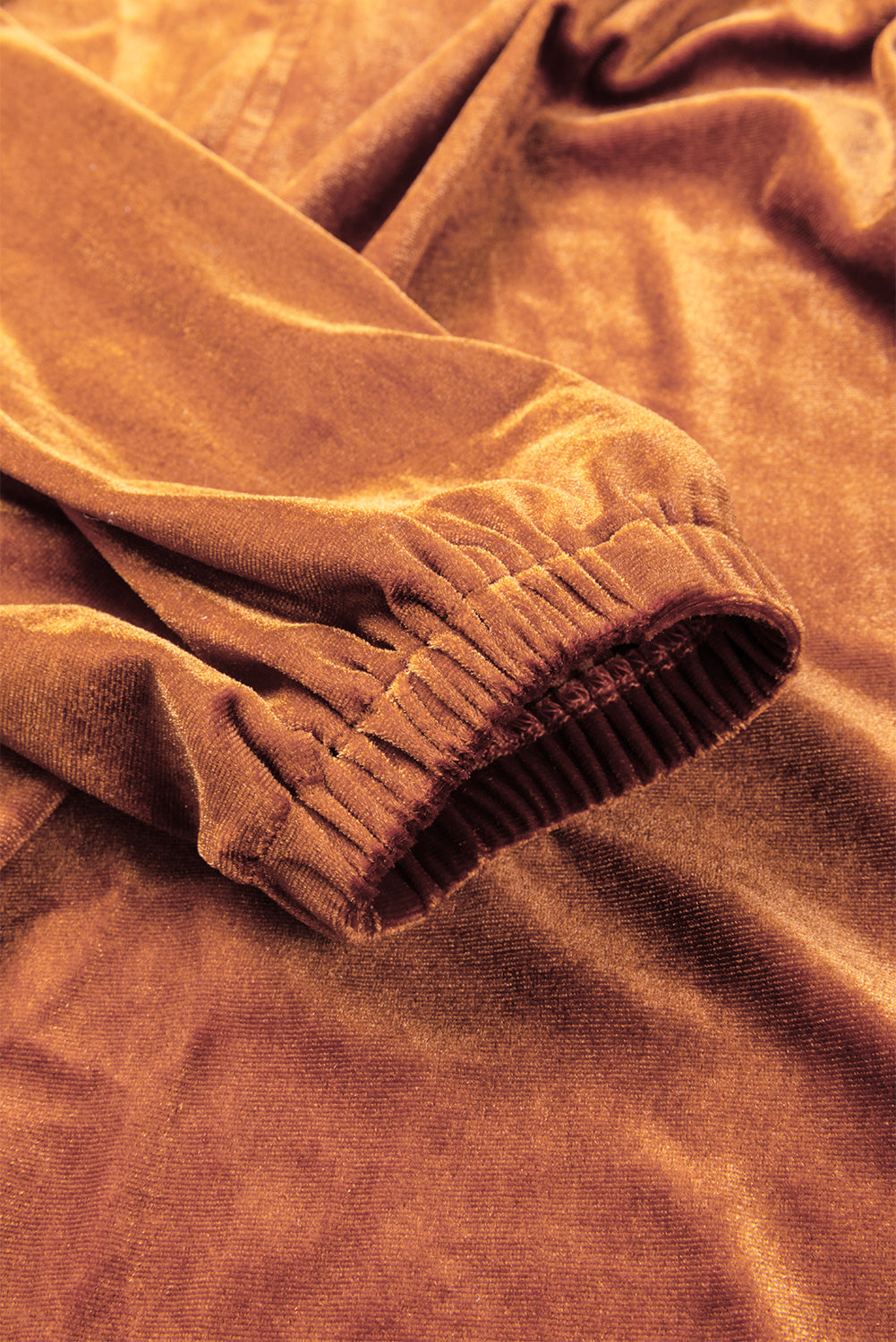 Chestnut Split Neck Velvet Tunic Dress featuring a V-neckline and pockets, made from soft velvet fabric.