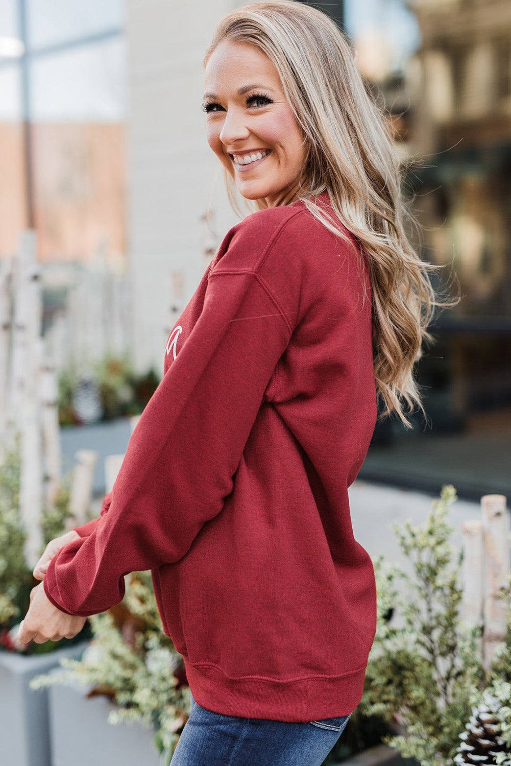 A cozy Christmas Santa Baby Print Pullover Sweatshirt featuring a festive design, long sleeves, and a relaxed fit, perfect for holiday celebrations.