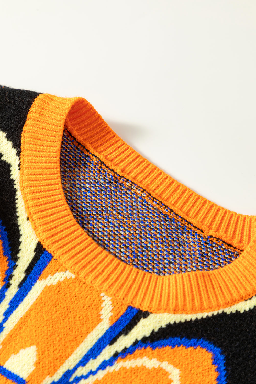 Citrus Ribbed Edge Drop Shoulder Floral Print Sweater featuring a vibrant floral pattern and ribbed edges, perfect for winter wear.