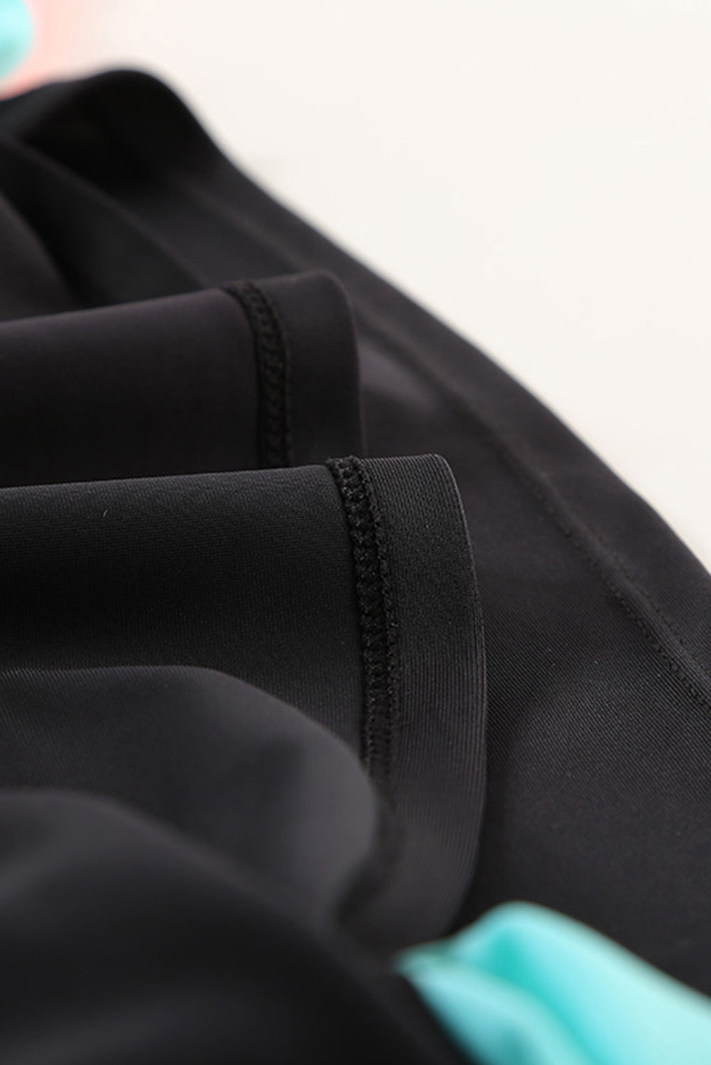 Color Zip Up Neckline Color Block Rashguard Top for women, featuring a stylish design with long sleeves and a zip front.