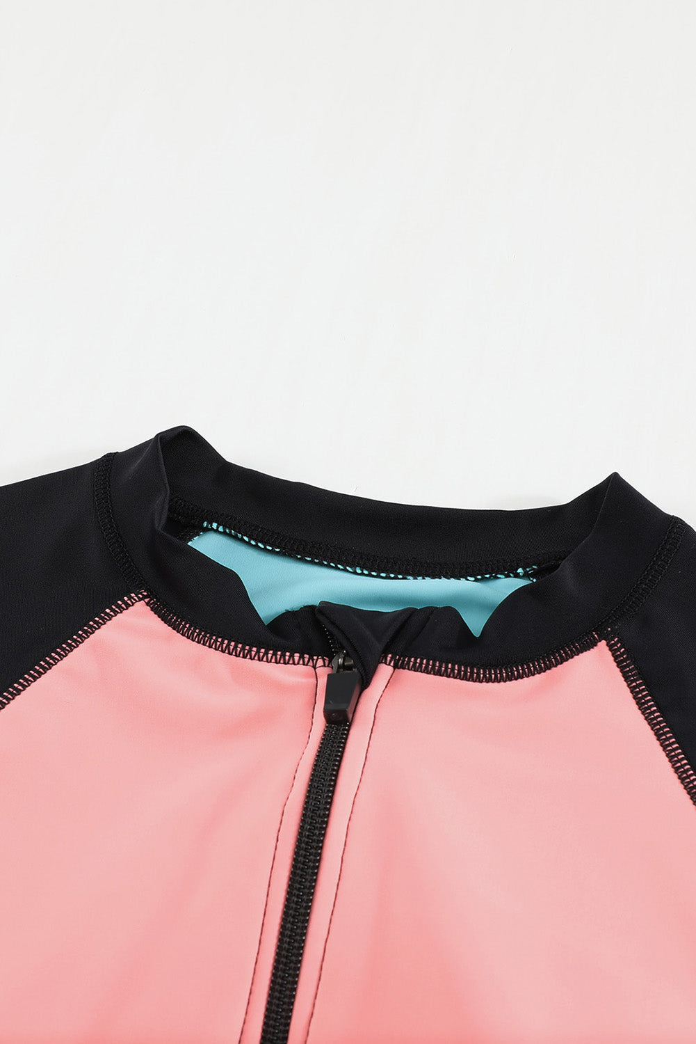 Color Zip Up Neckline Color Block Rashguard Top for women, featuring a stylish design with long sleeves and a zip front.
