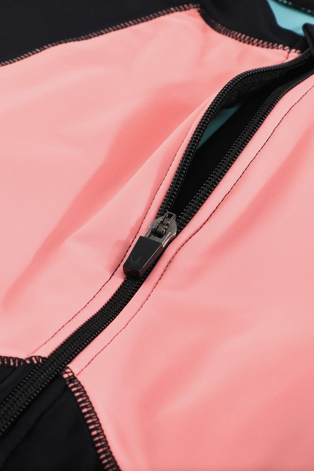 Color Zip Up Neckline Color Block Rashguard Top for women, featuring a stylish design with long sleeves and a zip front.