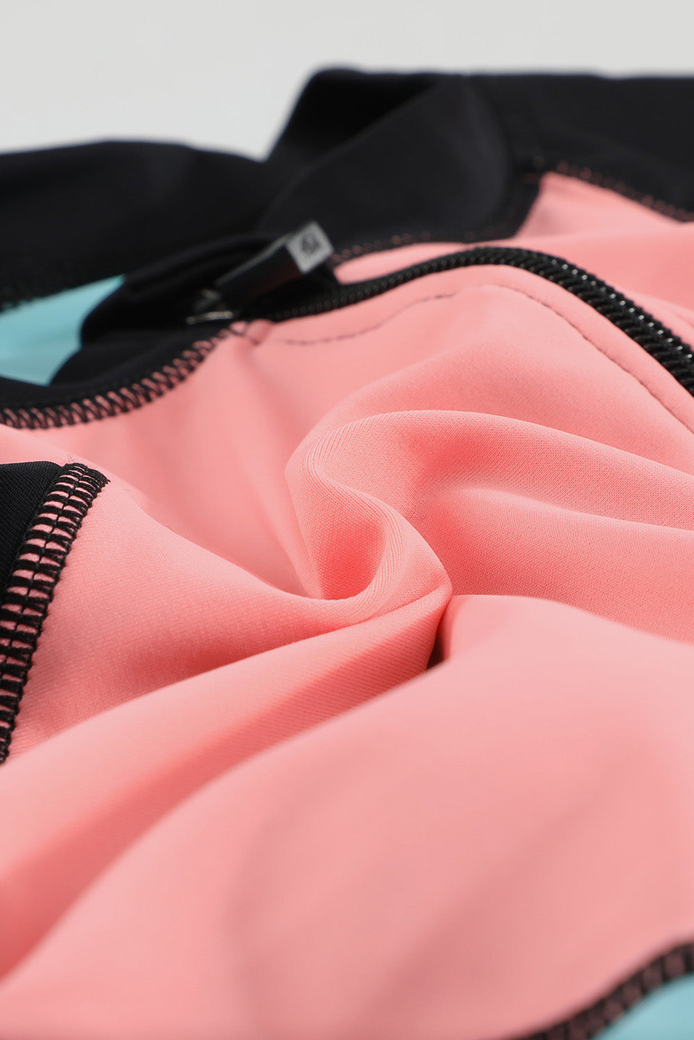 Color Zip Up Neckline Color Block Rashguard Top for women, featuring a stylish design with long sleeves and a zip front.