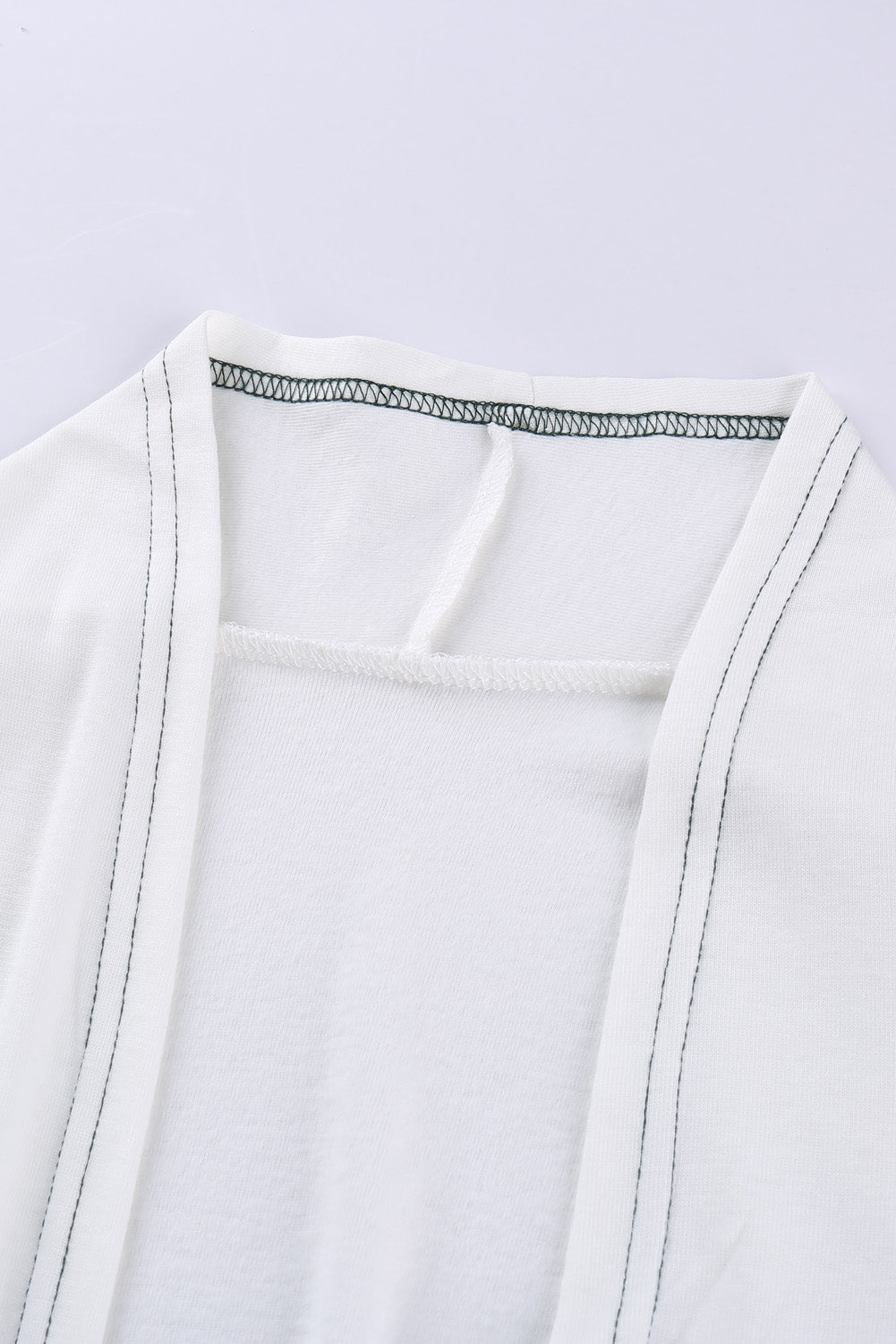 Colorblock Leopard Print Patchwork Knit Cardigan featuring an open front, long sleeves, and a stylish design.