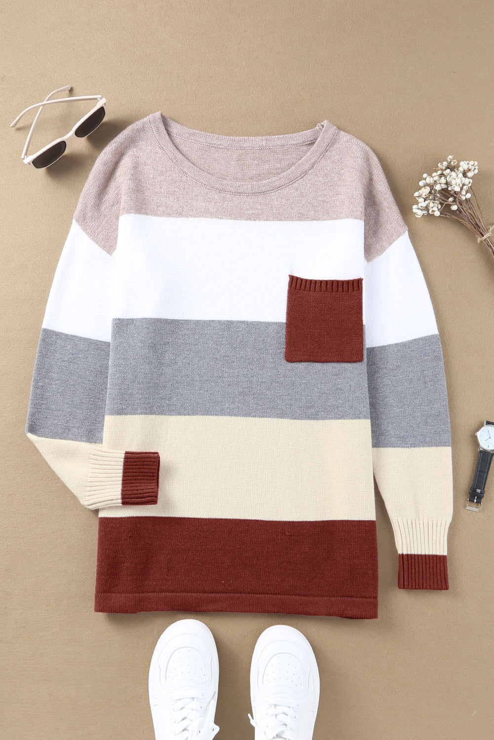 A stylish Colorblock Pocketed Sweater featuring a longline silhouette, vibrant color blocks, and convenient pockets, perfect for casual wear.