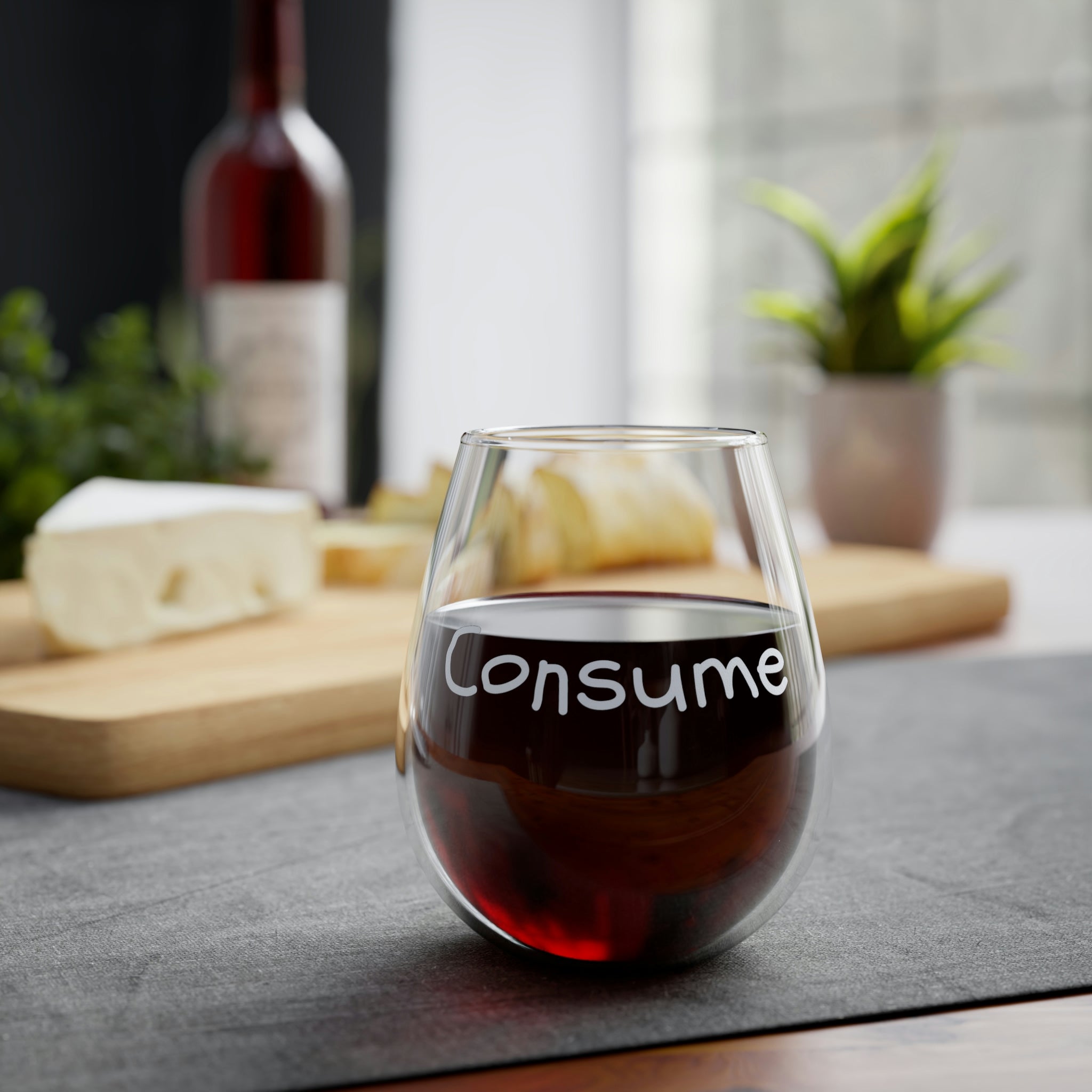A sleek and elegant stemless wine glass holding 11.75 oz of wine, featuring a glossy finish and personalized design options.