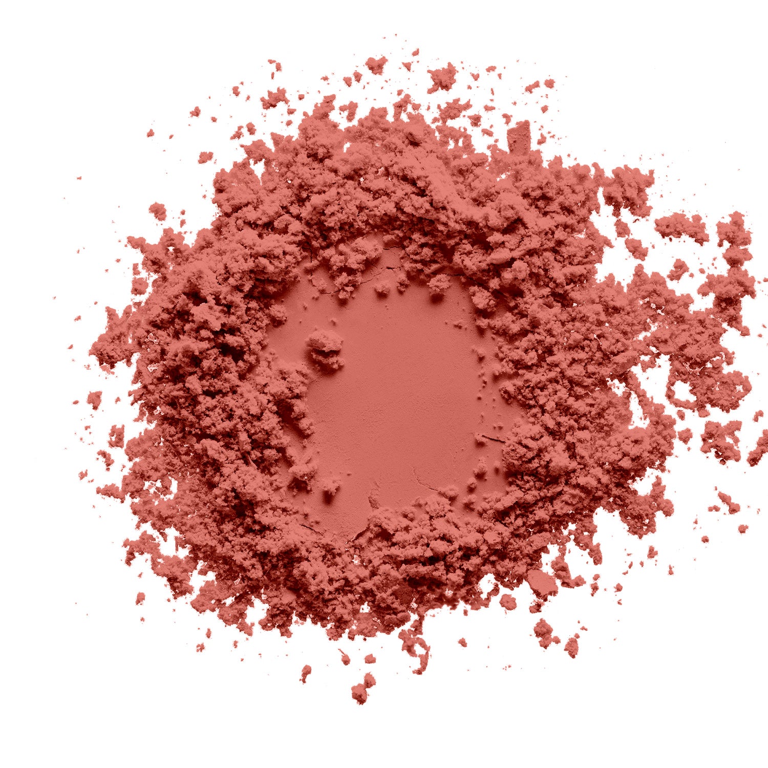 A compact of creamy coral blush showcasing its silky texture and vibrant color, perfect for adding a natural glow to cheeks.
