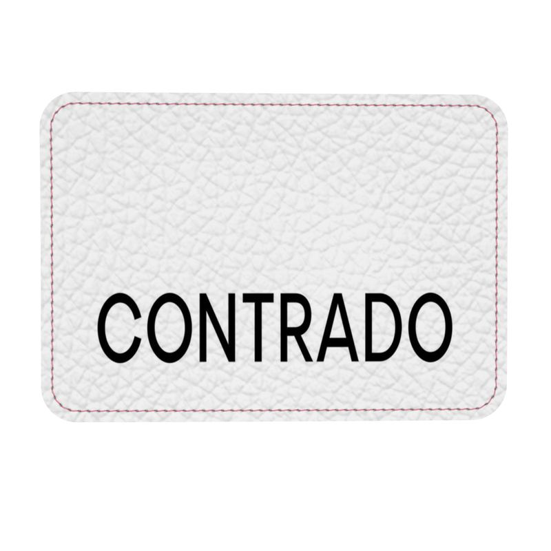 Stylish crossbody bag with a detachable chain strap and round metal zip pull, showcasing its unique design and craftsmanship.