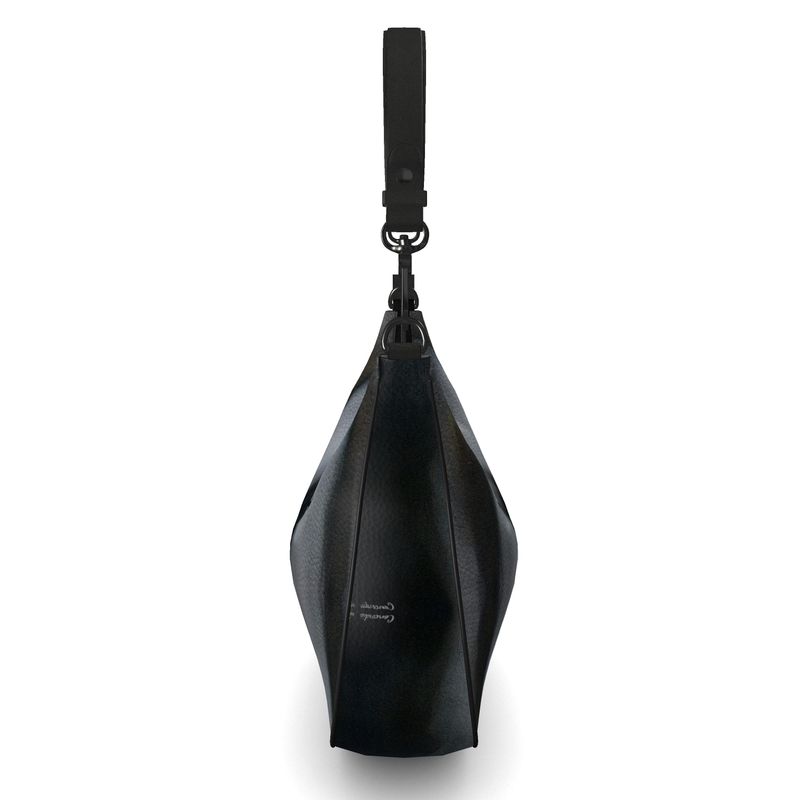 Curve Hobo Bag made from full-grain Nappa leather with faux suede lining, featuring two internal pockets.