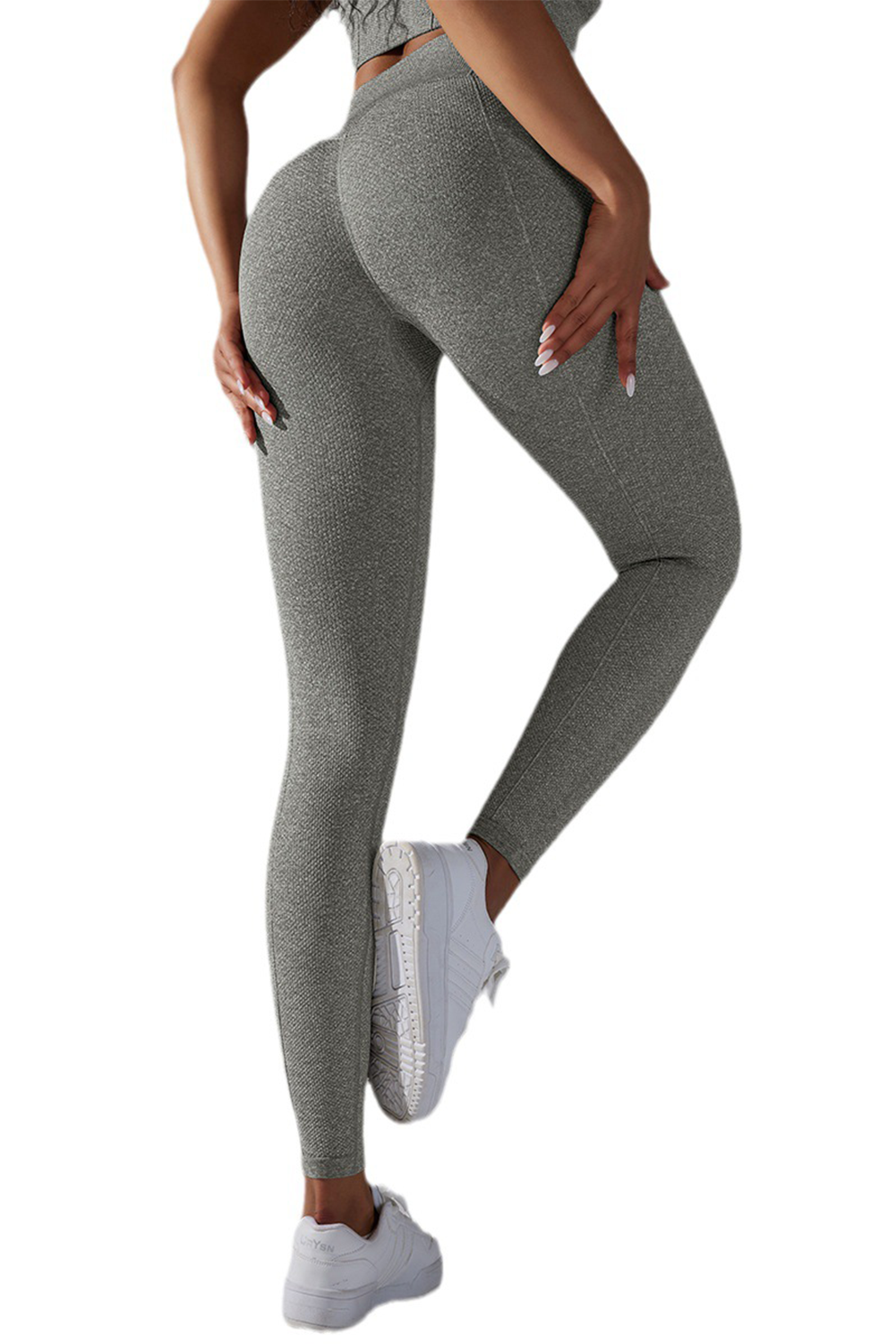 Dark grey high waist yoga leggings with stylish outer seam details, perfect for workouts and casual wear.