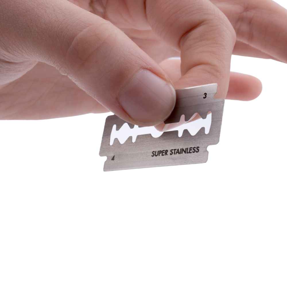 A pack of 20 double-sided safety razor blades, showcasing their sleek stainless steel design and bulk packaging for convenience.