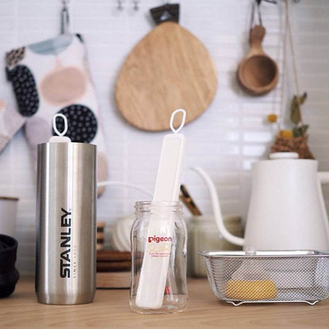 Drying Stick en céramique nano poreuse avec crochet en silicone, idéal pour sécher gourdes et biberons.