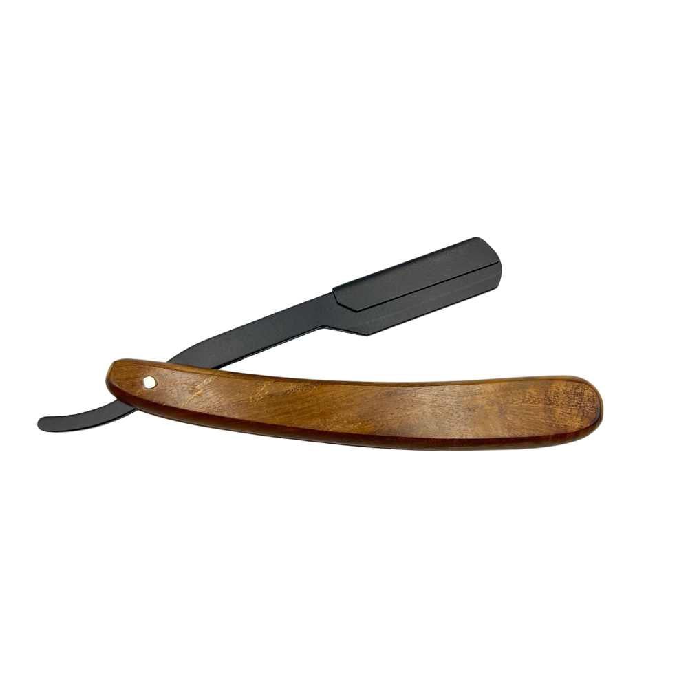 The Essential Shavette featuring a sleek alloy design and a wooden cover, showcasing its elegant and ergonomic shape.