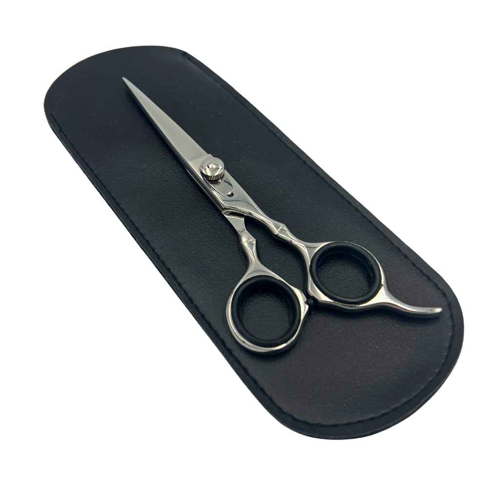 Essential Shears by Shave Essentials, featuring stainless steel blades and ergonomic non-slip handles for precise hair cutting.