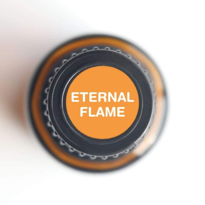 Eternal Flame Concentration Blend 100% Pure Essential Oil in a 15ml bottle, showcasing its floral and warm scent profile.