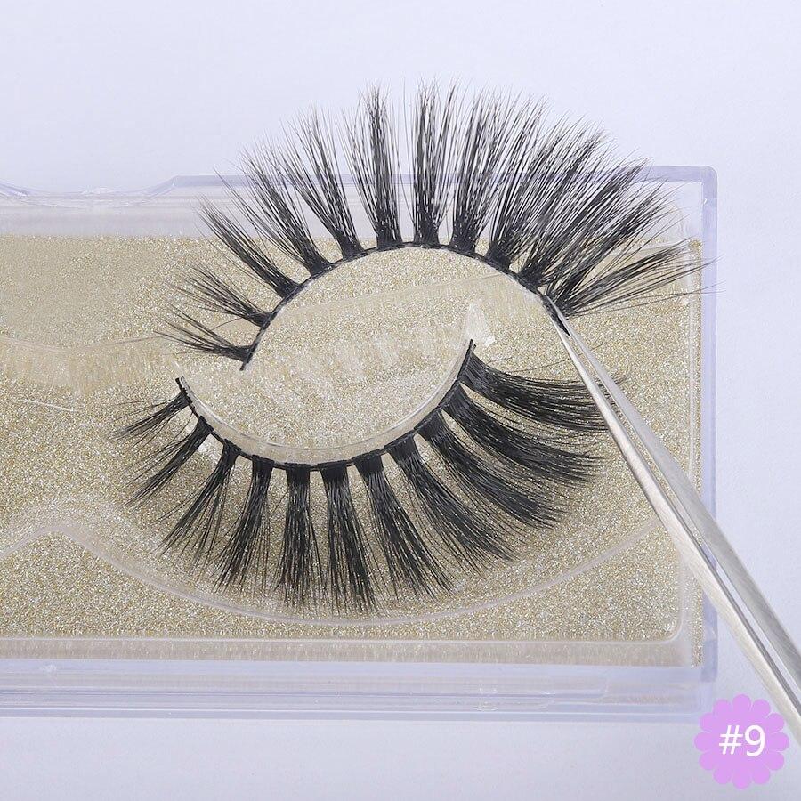A pair of Faux 3D Mink Eyelashes displayed in a transparent box, showcasing their dramatic and wispy design.