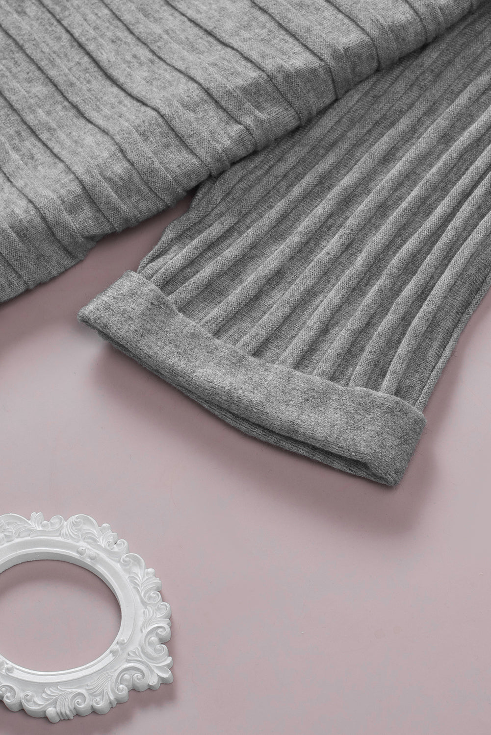 A stylish fiery red ribbed open front knit cardigan with 3/4 sleeves, perfect for layering over casual outfits.