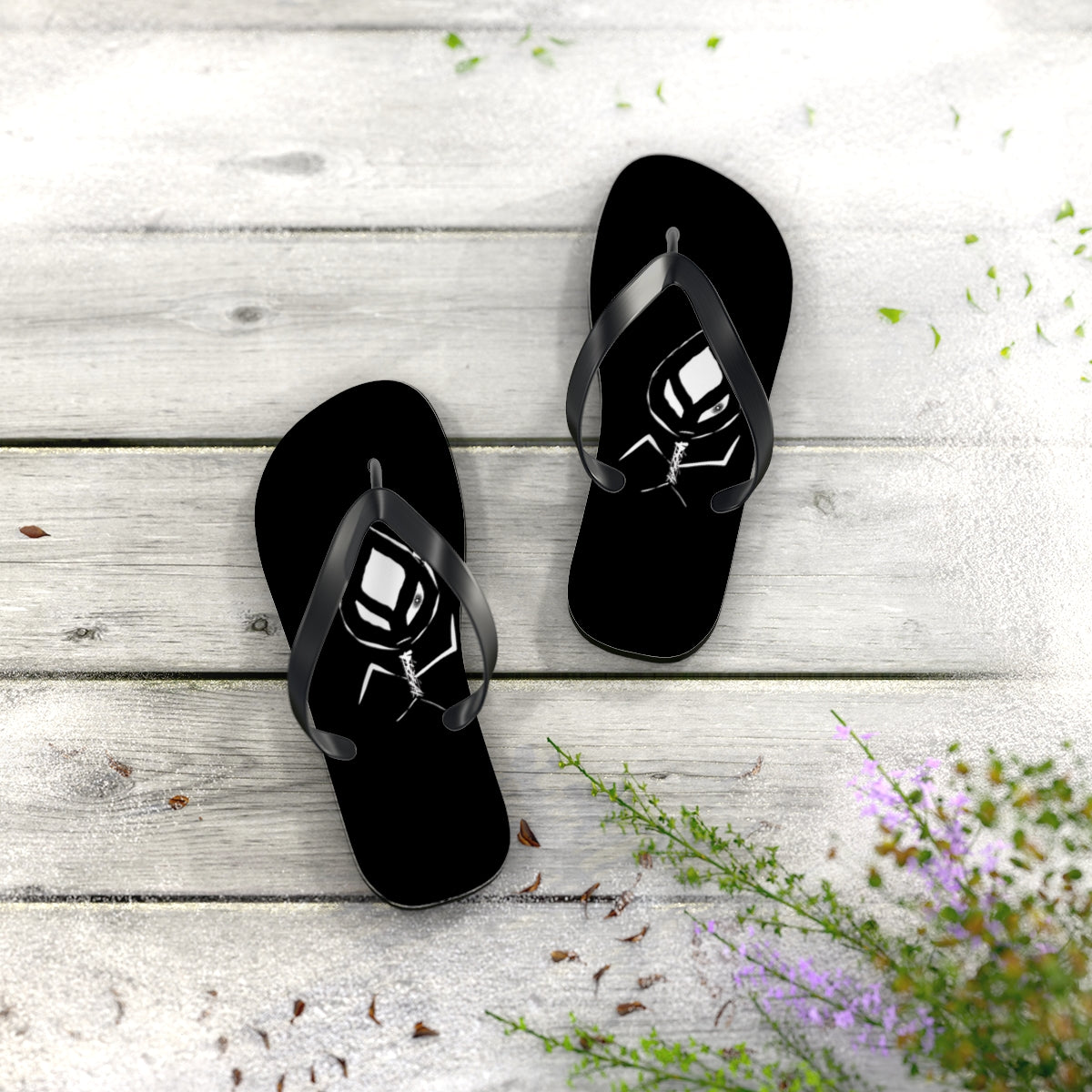 A pair of stylish flip flops with a cushioned footbed and black PVC strap, perfect for summer wear.