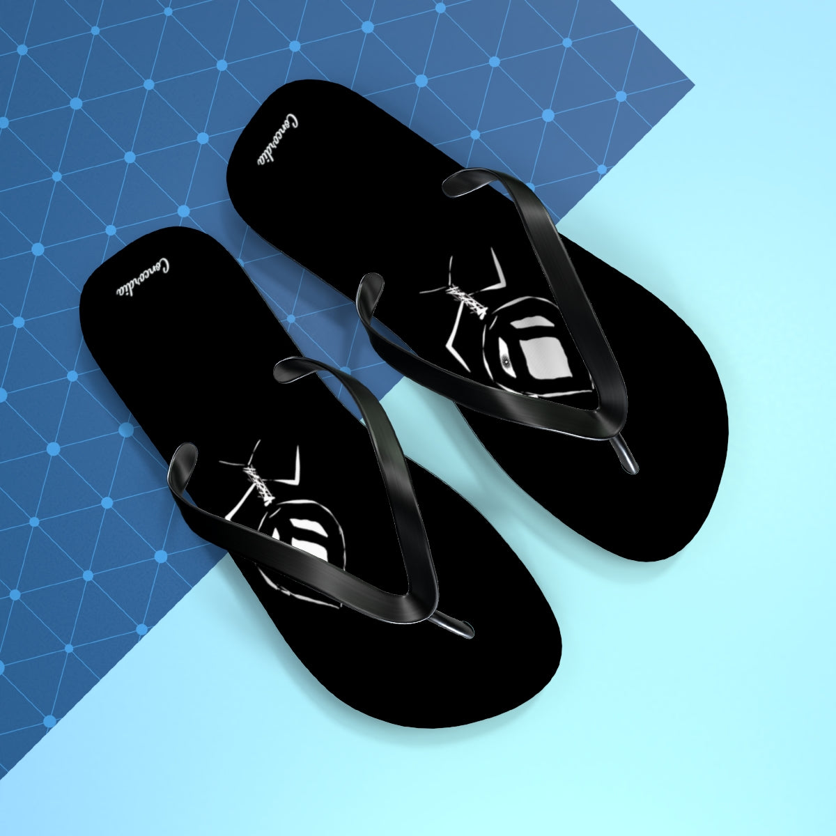 A pair of stylish flip flops with a cushioned footbed and black PVC strap, perfect for summer wear.