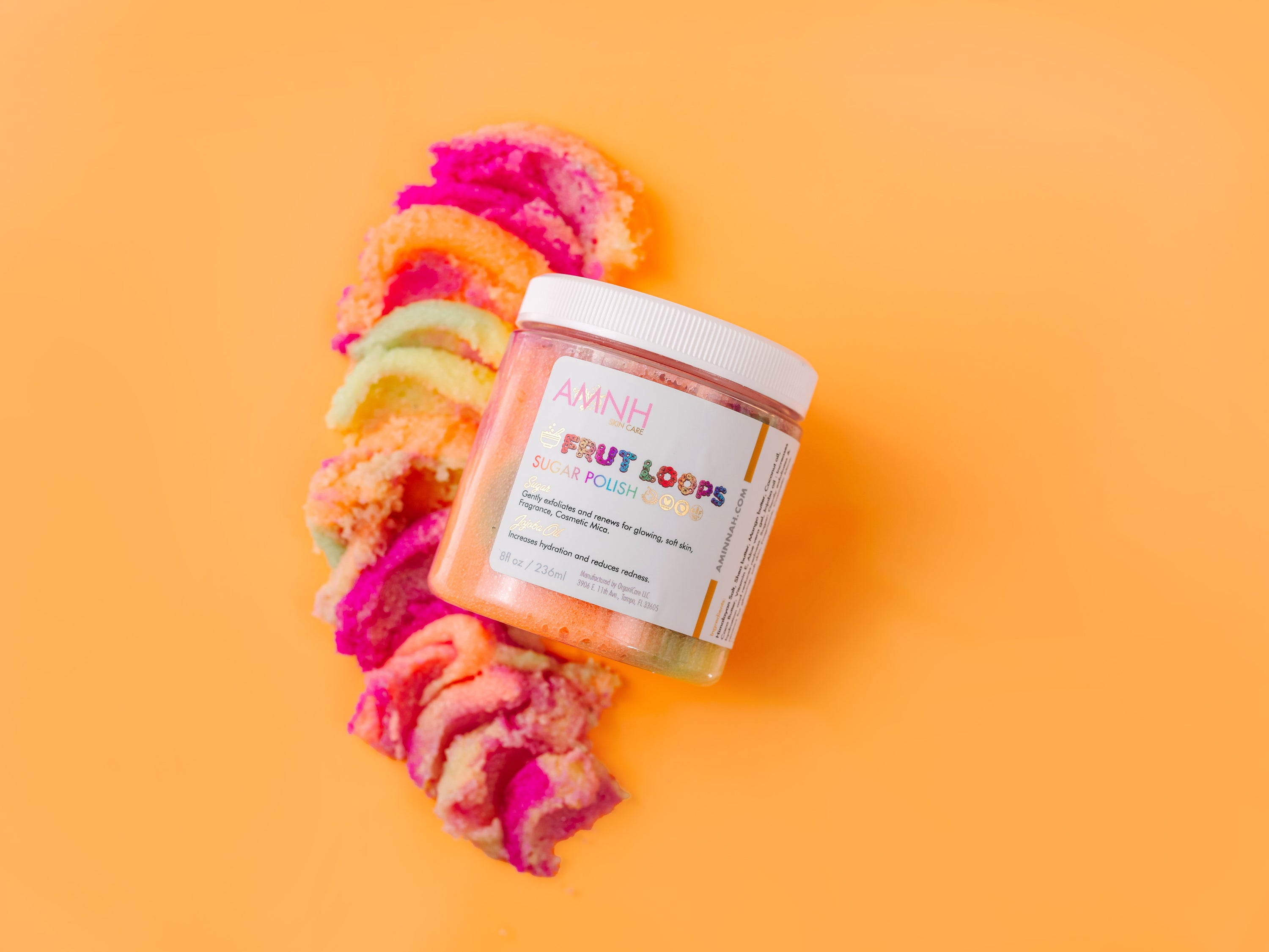 Frut Loops Sugar Scrub in a clear jar with colorful sugar granules resembling Fruit Loops cereal, showcasing its vibrant and fun appearance.