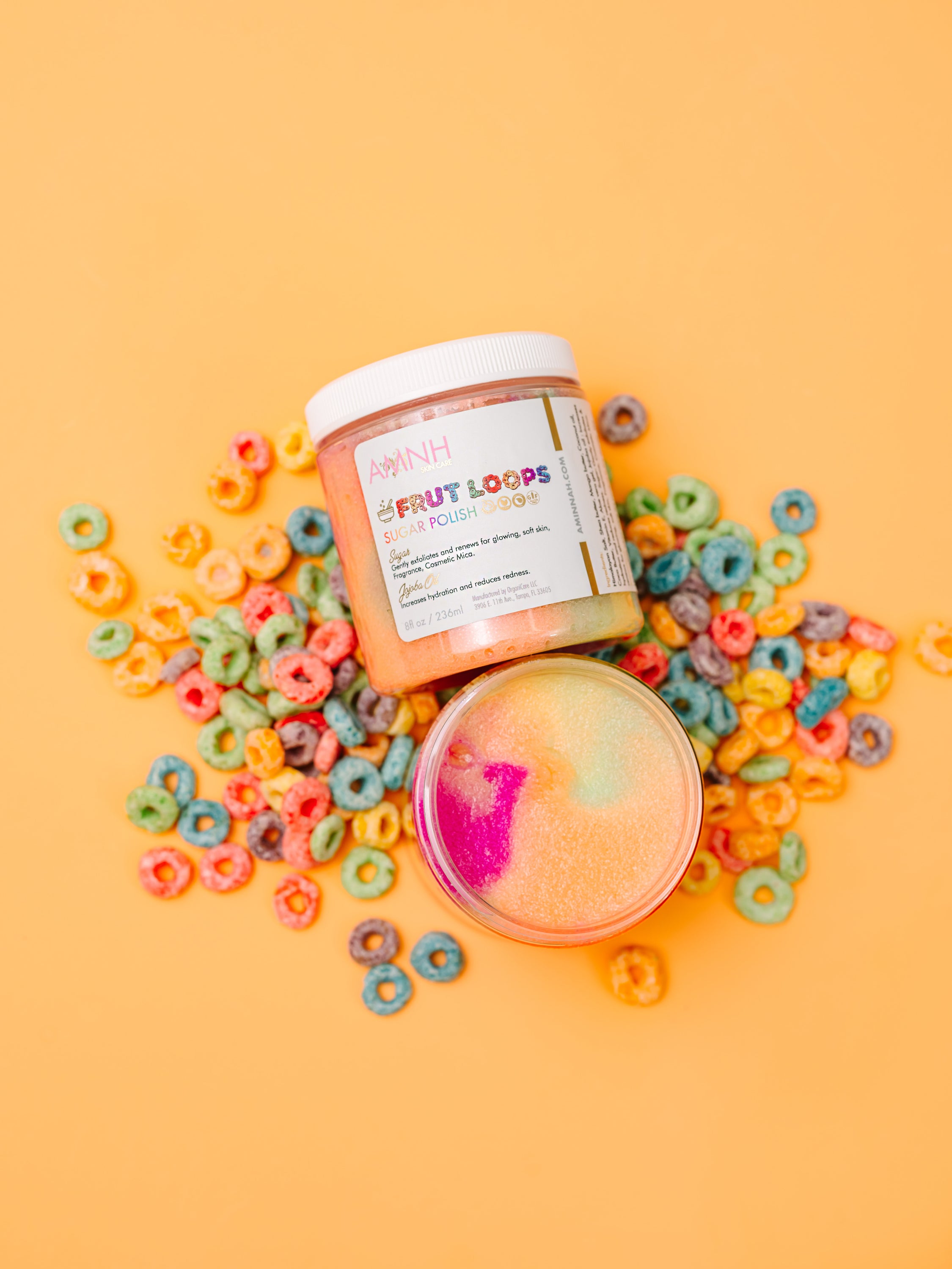 Frut Loops Sugar Scrub in a clear jar with colorful sugar granules resembling Fruit Loops cereal, showcasing its vibrant and fun appearance.