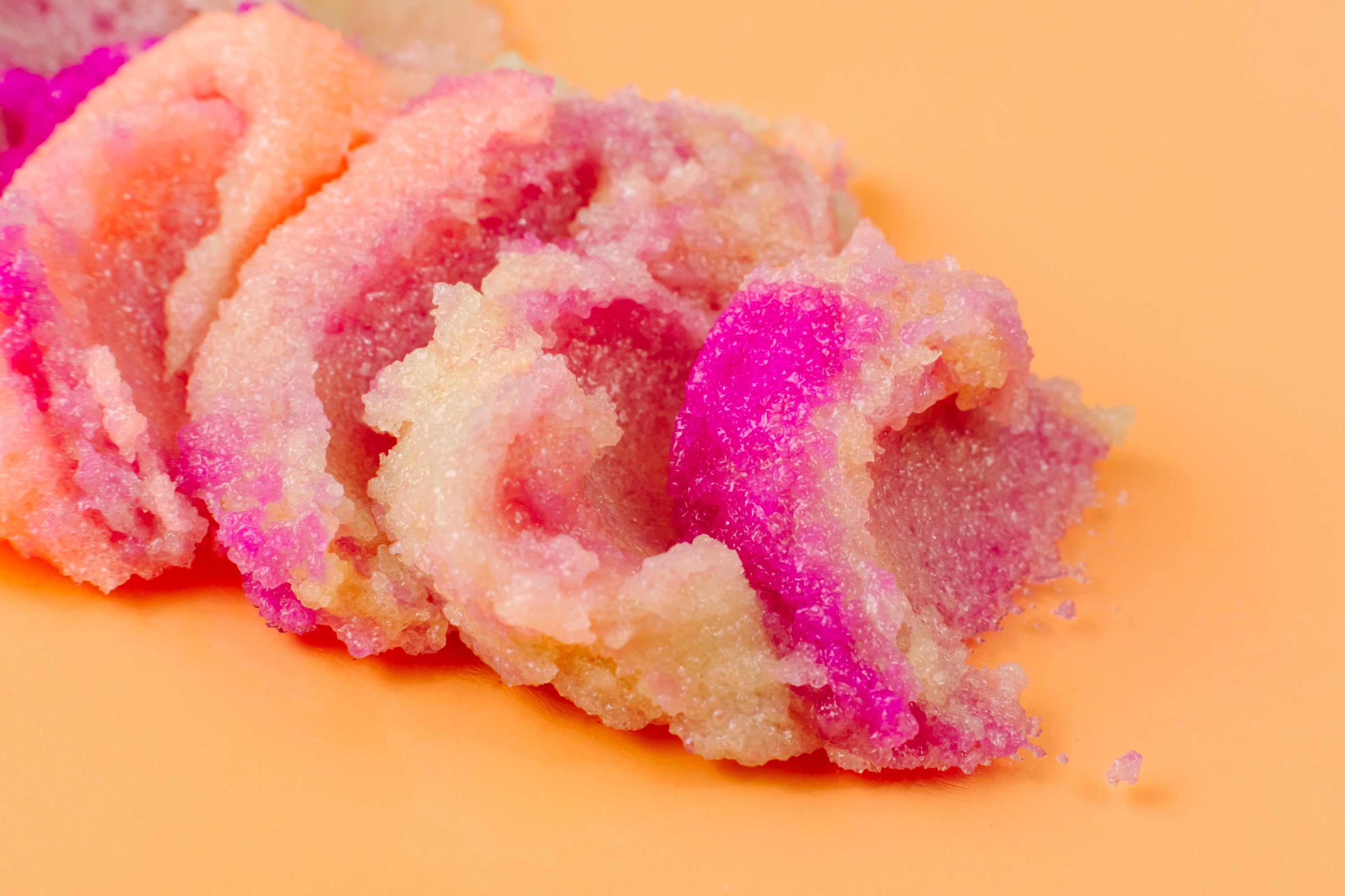 Frut Loops Sugar Scrub in a clear jar with colorful sugar granules resembling Fruit Loops cereal, showcasing its vibrant and fun appearance.