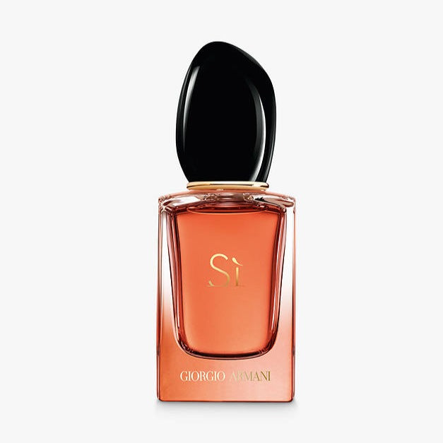 Giorgio Armani Si Eau de Parfum Intense bottle with blush tint and black cap, showcasing luxurious design.