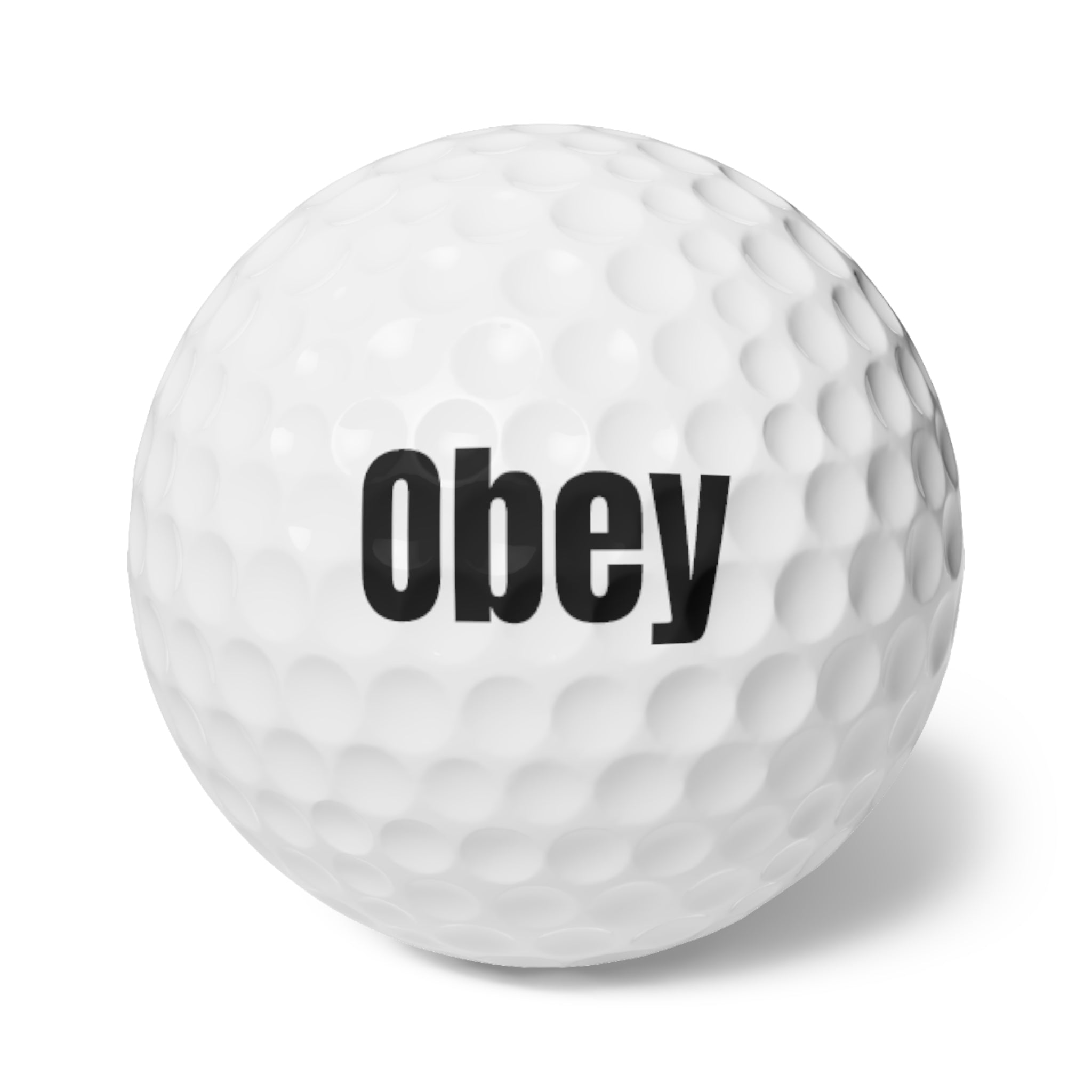 A pack of 6 personalized Obey golf balls made from durable surlyn, showcasing their standard size and quality design.