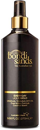 Bottle of Bondi Sands Gradual Tanning Liquid Gold Dry Oil with a golden hue, showcasing its lightweight and nourishing formula.