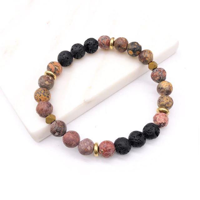 Granite Pattern Lava Stone Bracelet with essential oil absorption features, showcasing its unique design and texture.