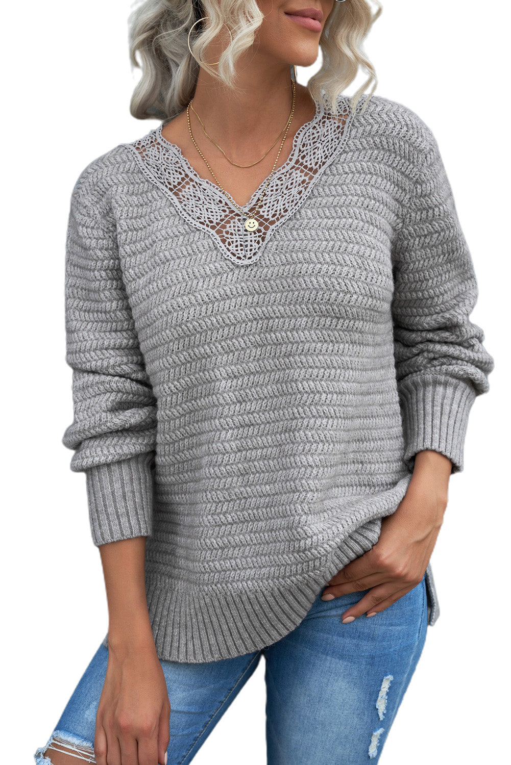 Gray loose sweater featuring a lace scalloped V-neck and side split design, perfect for a chic and comfortable look.