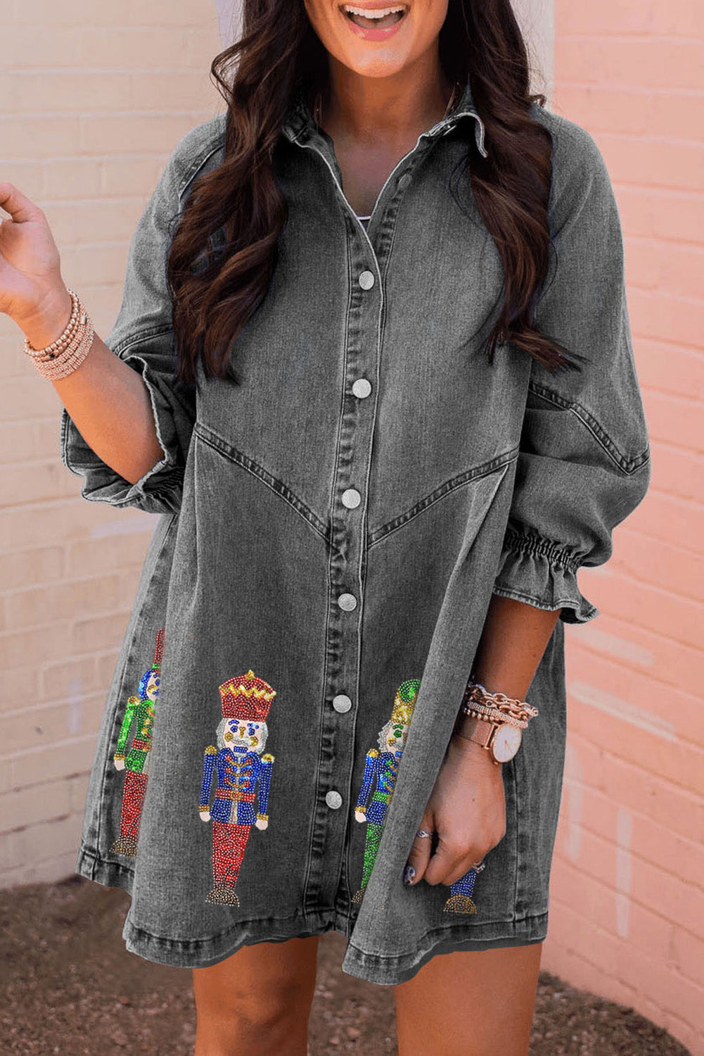 Gray long sleeve denim dress featuring a sequin nutcracker graphic, perfect for festive occasions.