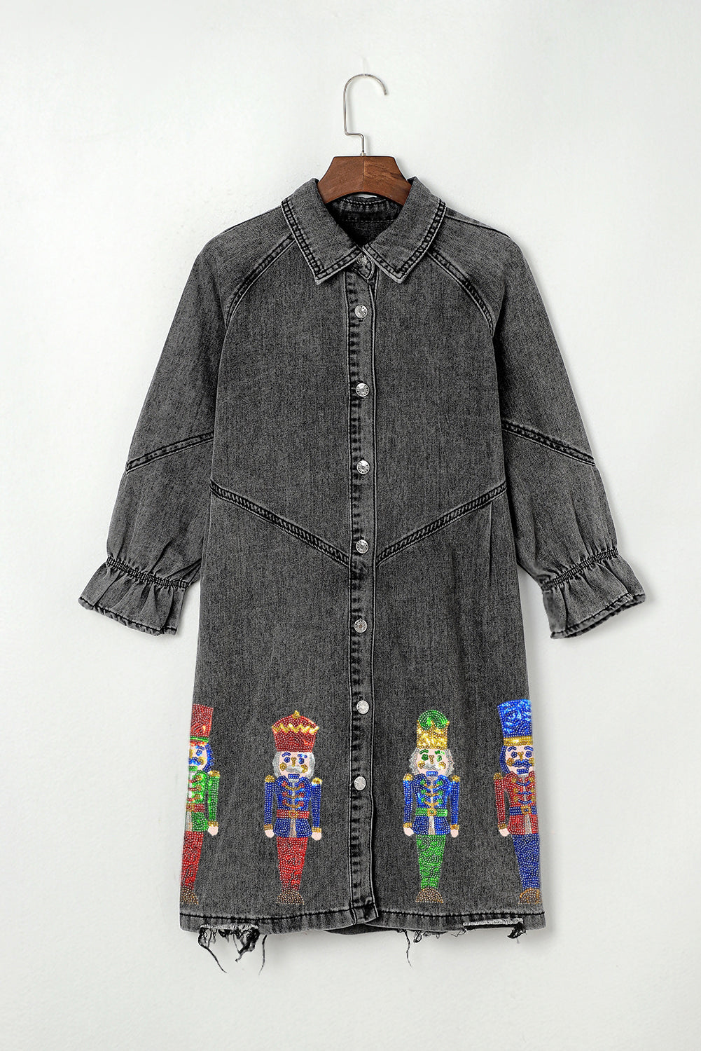 Gray long sleeve denim dress featuring a sequin nutcracker graphic, perfect for festive occasions.