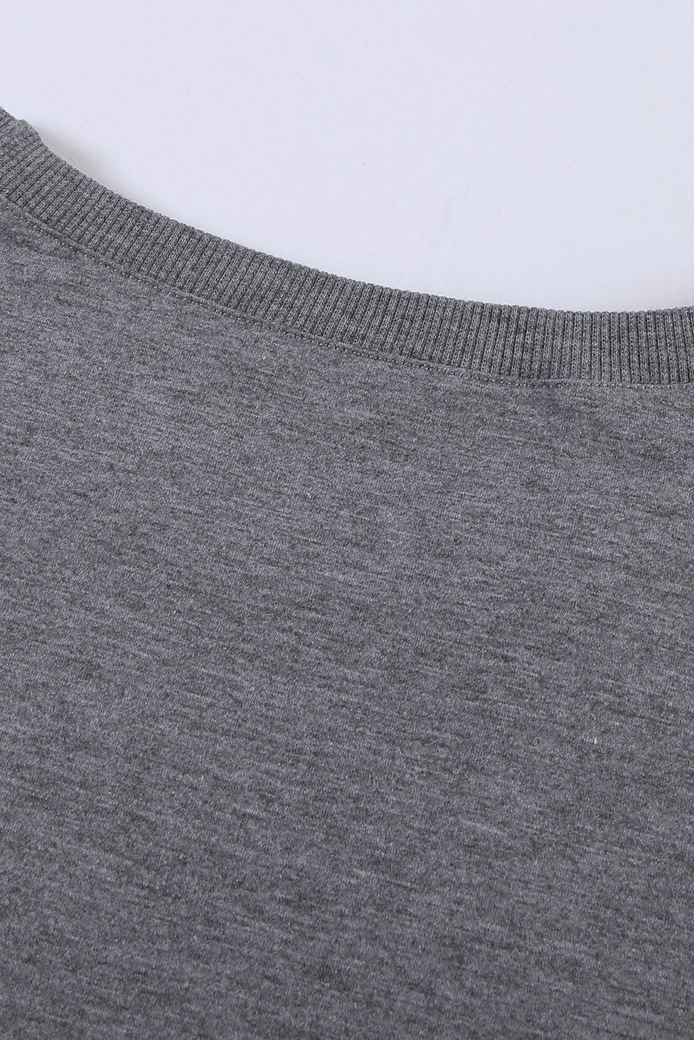 Gray solid crew neck pullover sweatshirt displayed on a mannequin, showcasing its long sleeves and comfortable fit.