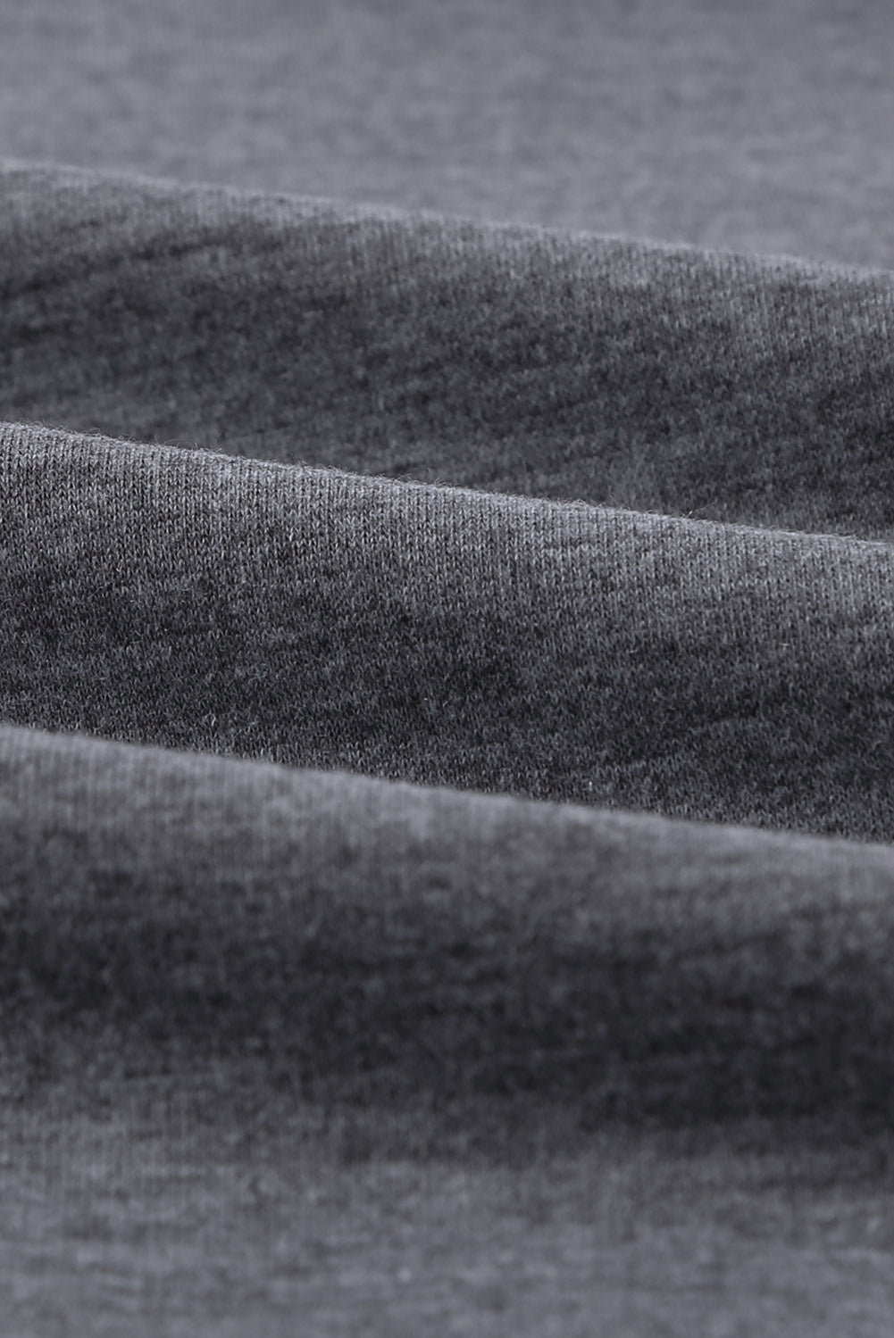 Gray solid crew neck pullover sweatshirt displayed on a mannequin, showcasing its long sleeves and comfortable fit.