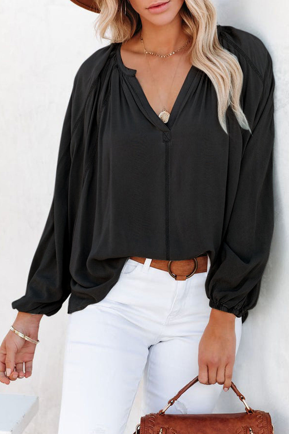Gray Split V Neck Dolman Top featuring a relaxed fit, long sleeves with elastic cuffs, and a stylish high-low hemline.