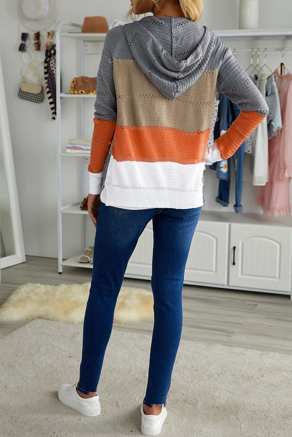 Gray zipped front colorblock hollow-out knit hoodie with drawstring hood and stylish design.