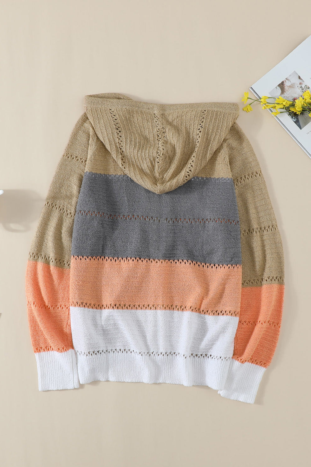Gray zipped front colorblock hollow-out knit hoodie with drawstring hood and stylish design.