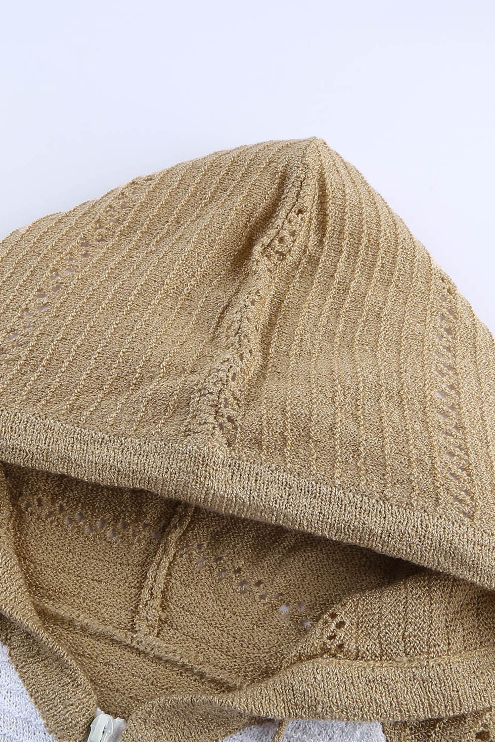 Gray zipped front colorblock hollow-out knit hoodie with drawstring hood and stylish design.