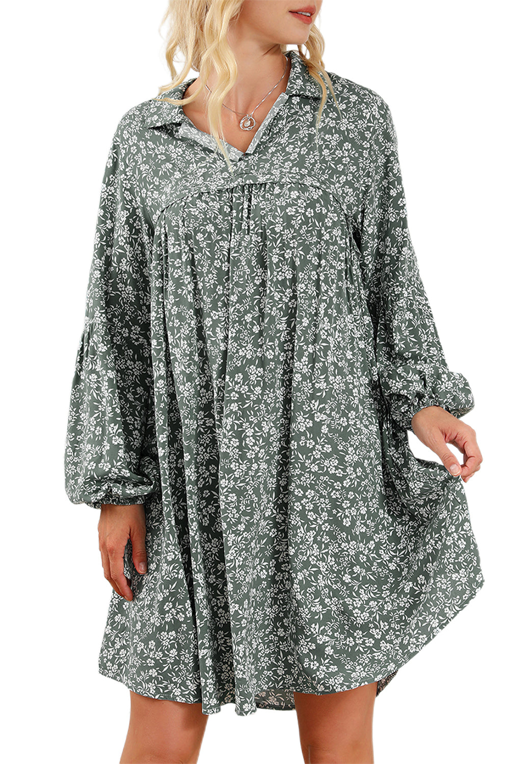 A stylish green floral print collared babydoll dress with puff sleeves, perfect for casual and dressy occasions.