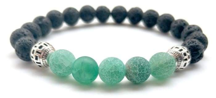 A stylish Green Lava Stone Essential Oil Bracelet showcasing natural lava stones, perfect for absorbing and diffusing essential oils.